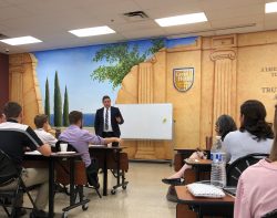 The Headmaster speaking to the faculty